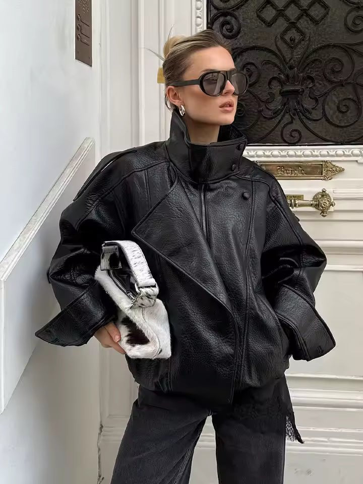 Elena Asimetrična jakna s džepovima i gumbima