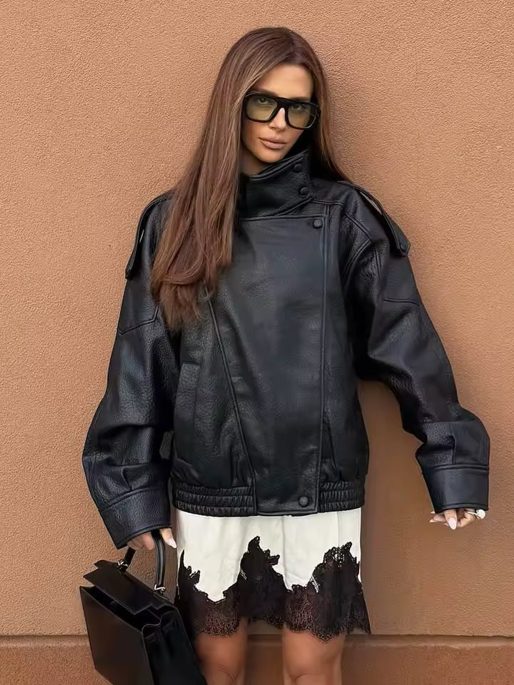 Elena Asimetrična jakna s džepovima i gumbima
